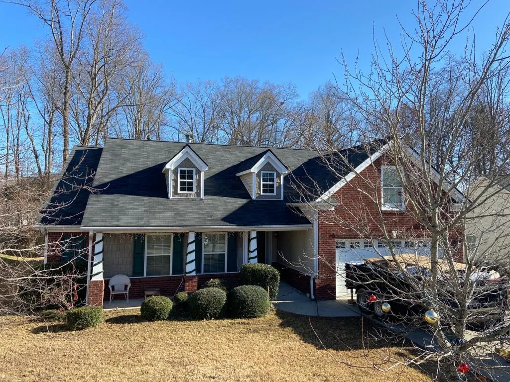 Brick home with new roof in Buford, GA
